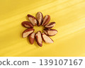 Brazil nuts arranged in a circle 139107167