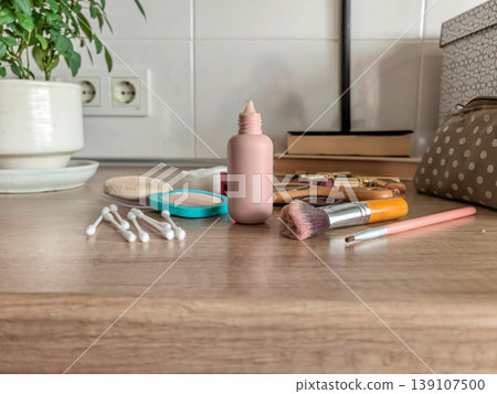 Beauty and makeup essentials on dressing table Beauty and makeup essentials on dressing table 139107500