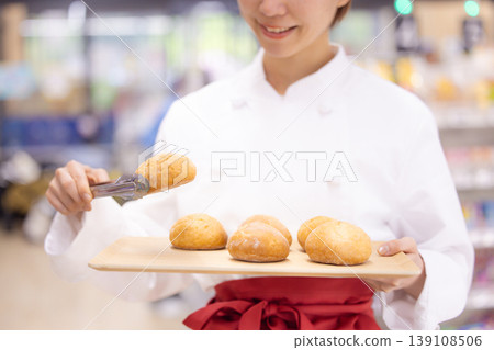 Supermarket bakery staff's hands Supermarket bakery staff's hands 139108506