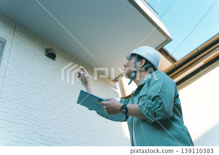 A company that inspects the soffit under the balcony. A company that inspects the soffit under the balcony. 139110383
