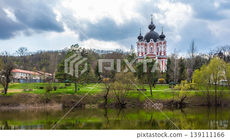 Panoramic View of Curchi Monastery Reflected in Peaceful Lake Water Panoramic View of Curchi Monastery Reflected in Peaceful Lake Water 139111166