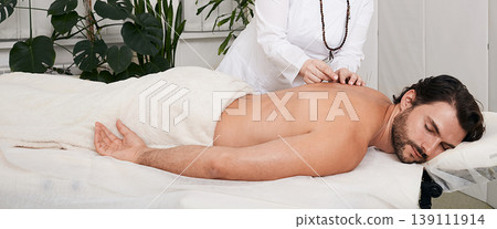 Treatment of back pain with acupuncture needles for man patient. Traditional Chinese Medicine Treatment of back pain with acupuncture needles for man patient. Traditional Chinese Medicine 139111914