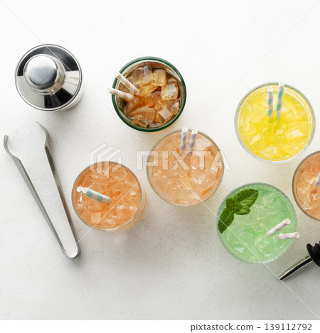 Minimal colorful iced cocktails flat lay 139112792