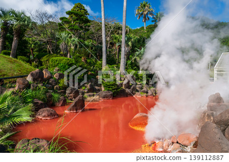 Chinoike Jigokuor Blood pond hell with  steam against blue sky, Beppu 139112887