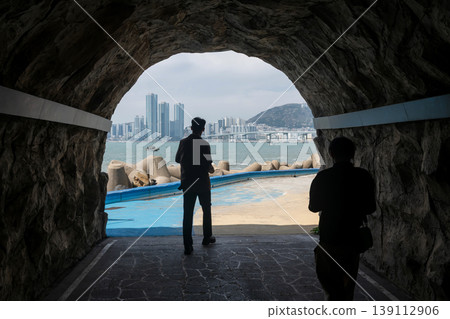 people walk through famous tunnel of Huinnyeoul Village, Busan people walk through famous tunnel of Huinnyeoul Village, Busan 139112906
