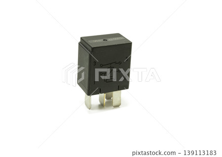 Close up of a black 4 pin universal automotive relay with circuit diagram, essential for vehicle electrical systems and DIY electronics. Close up of a black 4 pin universal automotive relay with circuit diagram, essential for vehicle electrical systems and DIY electronics. 139113183