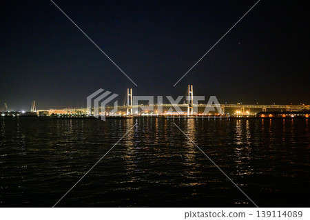 The Bay Bridge and Daikoku Pier floating in Yokohama Port at night The Bay Bridge and Daikoku Pier floating in Yokohama Port at night 139114089