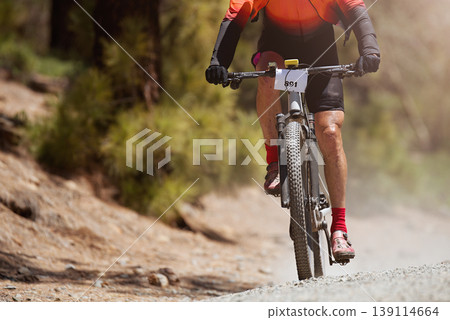 Mountain biking man riding on bike in summer mountains forest landscape. Sport fitness motivation and inspiration in beautiful inspirational landscape Mountain biking man riding on bike in summer mountains forest landscape. Sport fitness motivation and inspiration in beautiful inspirational landscape 139114664