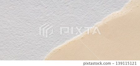 Torn white and beige paper edges with rough textured surface for minimalist craft background 139115121