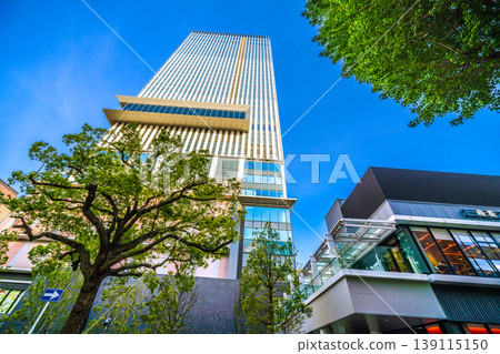 Yokohama cityscape, Japan, April 21st. A view of the newly built Base Gate Yokohama Kannai Tower and security cameras in front of Kannai Station. Yokohama cityscape, Japan, April 21st. A view of the newly built Base Gate Yokohama Kannai Tower and security cameras in front of Kannai Station. 139115150