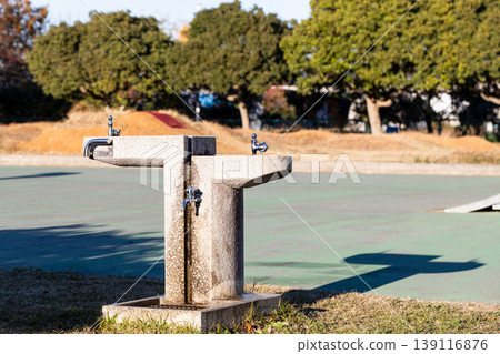 Upward-facing drinking faucet in the park Upward-facing drinking faucet in the park 139116876
