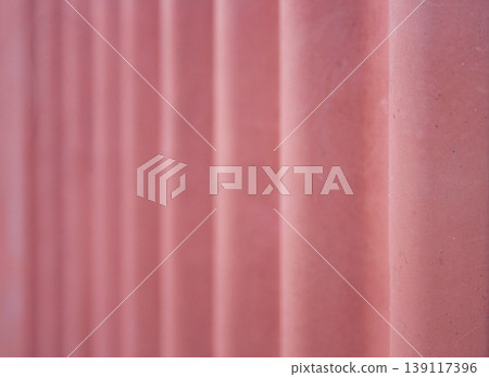 Reddish corrugated sheet metal background. space for text Reddish corrugated sheet metal background. space for text 139117396