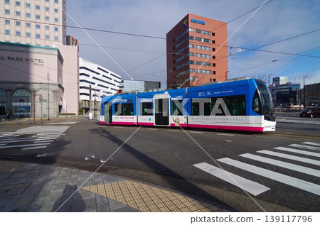 Toyama Port Line running through the intersection Toyama Port Line running through the intersection 139117796