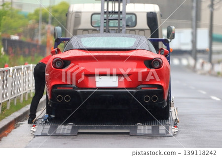 Car carrier loaded with sports cars 139118242