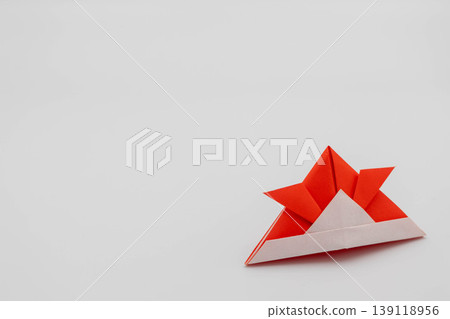 Origami samurai helmet for Children's Day (Tango no Sekku) - Material - Copy space - Red - White background Origami samurai helmet for Children's Day (Tango no Sekku) - Material - Copy space - Red - White background 139118956