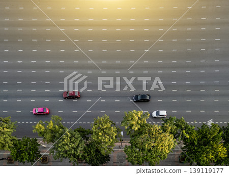 Aerial, road and highway with vehicles for transportation, traffic flow or infrastructure. Outdoor, empty and driving on street for travel destination, commute or environment. Aerial, road and highway with vehicles for transportation, traffic flow or infrastructure. Outdoor, empty and driving on street for travel destination, commute or environment. 139119177
