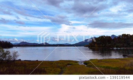 View of Mount Bandai from the shores of Lake Akimoto | The tranquil surface of the lake in autumn 139119544