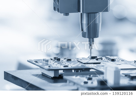 High-tech robotic system assembling electronic components on a PCB board in a smart factory environment. High-tech robotic system assembling electronic components on a PCB board in a smart factory environment. 139120116