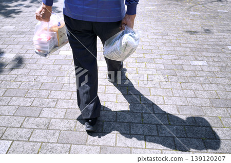 The urban landscape of Yokohama, Japan; natto, sliced bread, pickled vegetables... an aging society... an elderly man returning from shopping... dietary habits... what is life...? The urban landscape of Yokohama, Japan; natto, sliced bread, pickled vegetables... an aging society... an elderly man returning from shopping... dietary habits... what is life...? 139120207