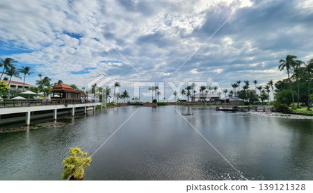 Luxury Tropical Resort Landscape with Pond and Palm Trees in Thailand Luxury Tropical Resort Landscape with Pond and Palm Trees in Thailand 139121328