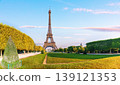 Breathtaking view of the Eiffel Tower against a cloudy sky, seen from the Champ de Mars 139121353