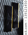 Black DDR5 RAM memory modules placed on a aluminum radiator. RAM shortages on the market, rising prices, and increased demand driven by the growing need for AI training. 139121450