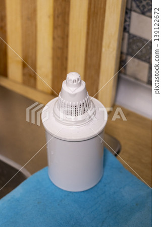 The replacement water filter cartridge designed for pitcher filtration system The replacement water filter cartridge designed for pitcher filtration system 139122672