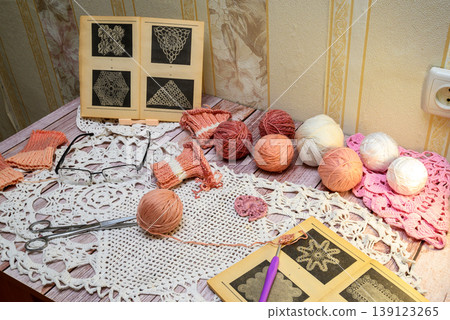 crochet set with pink yarn balls and lace art books crochet set with pink yarn balls and lace art books 139123265