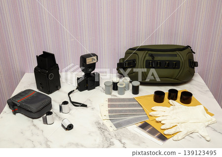 equipment for film photography and development on a table equipment for film photography and development on a table 139123495
