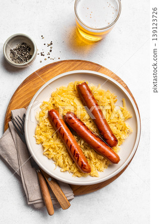 Bavarian Bratwurst meal with Sauerkraut and Beer Bavarian Bratwurst meal with Sauerkraut and Beer 139123726