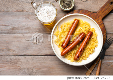German Bratwurst meal with Sauerkraut and Beer 139123728