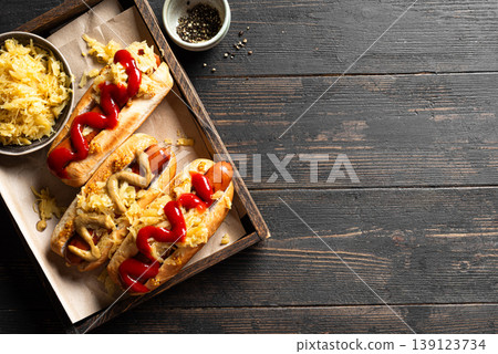 Bratwurst sausages with sauerkraut in roll bun 139123734