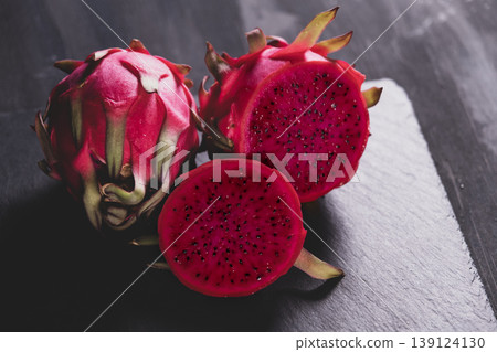 Dragon fruit on a grey granite background. 139124130
