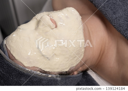 Woman getting a mask for skin care. 139124184