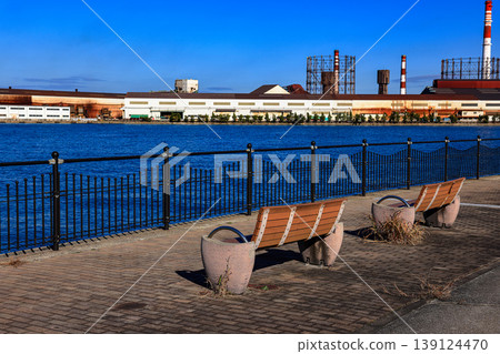 Steel bench in a seaside park. Steel bench in a seaside park. 139124470