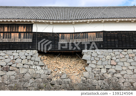 The collapsed stone wall of Kumamoto Castle, The devastation of Kumamoto Castle after the earthquake. The collapsed stone wall of Kumamoto Castle, The devastation of Kumamoto Castle after the earthquake. 139124504