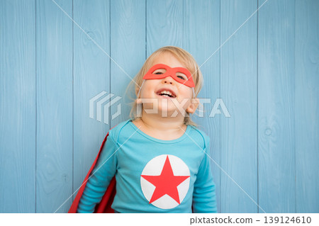 Little boy dressed as a superhero having fun at home Little boy dressed as a superhero having fun at home 139124610