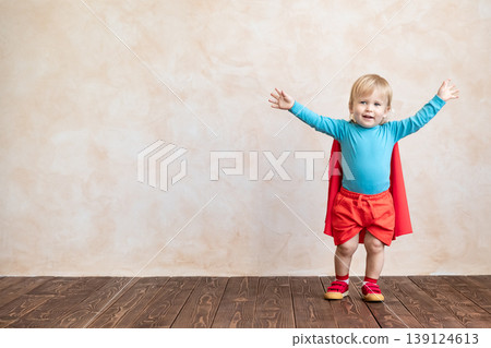 Little boy dressed as a superhero having fun at home Little boy dressed as a superhero having fun at home 139124613
