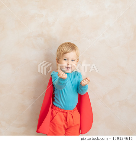 Little boy dressed as a superhero having fun at home Little boy dressed as a superhero having fun at home 139124615