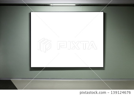 Minimal gallery scene featuring a large blank canvas frame mounted on green wall Minimal gallery scene featuring a large blank canvas frame mounted on green wall 139124676