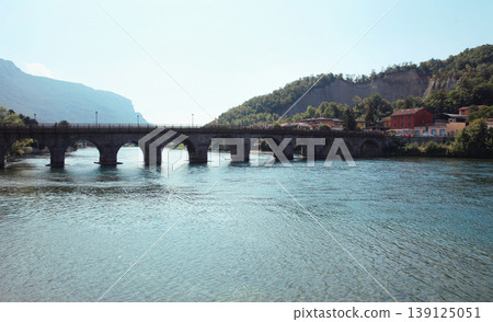 Lecco old bridge and the lake Como, Italy Lecco old bridge and the lake Como, Italy 139125051