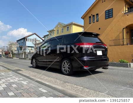 A minivan driving on the road A minivan driving on the road 139125857