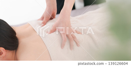 A woman receiving a treatment at a beauty salon (banner) A woman receiving a treatment at a beauty salon (banner) 139126604