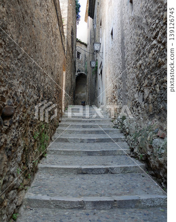 A staircase in an alley in Girona, a suburb of Barcelona A staircase in an alley in Girona, a suburb of Barcelona 139126745
