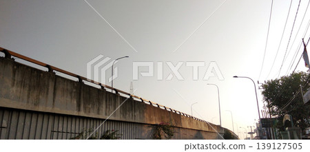 City Streets with Overpasses and Sunset Skies in Indonesia City Streets with Overpasses and Sunset Skies in Indonesia 139127505