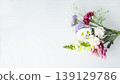 Background frame for a bouquet of flowers offered as a memorial; copy space 139129786