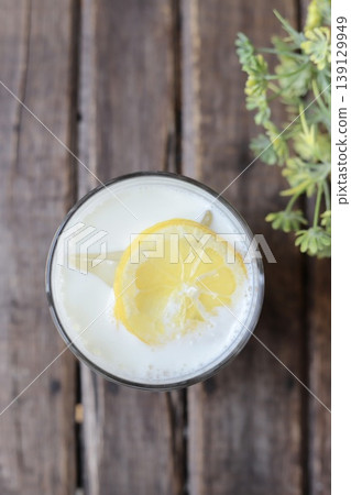 Lemon lassi made with homemade lemon syrup Lemon lassi made with homemade lemon syrup 139129949