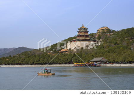View of the ancient Buddhist Foxiange Temple from the lake in Yiheyuan Park in Beijing, China View of the ancient Buddhist Foxiange Temple from the lake in Yiheyuan Park in Beijing, China 139130309