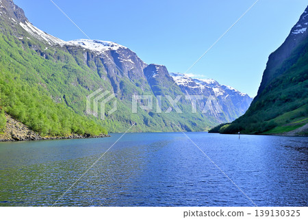 buoys installed in the narrow section of Nærøyfjord to prevent grounding buoys installed in the narrow section of Nærøyfjord to prevent grounding 139130325