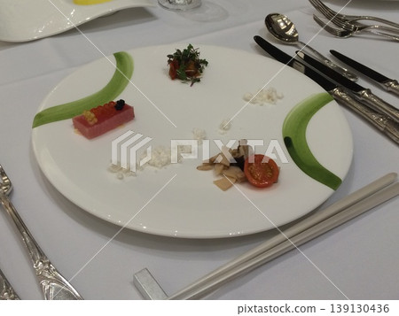 French appetizers beautifully arranged on a white plate French appetizers beautifully arranged on a white plate 139130436